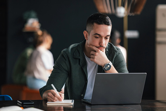 Professional adult on laptop