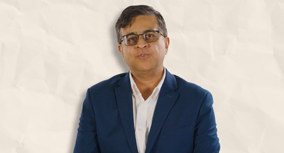 Dhruv Maniktala wearing blue suit with white shirt